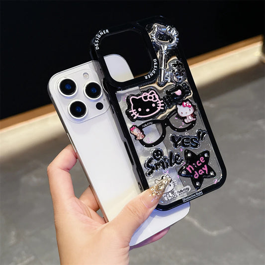 Hello Kitty-themed phone case with various charms and stickers.