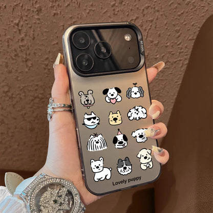Phone case with dog illustrations held by a person against a brown background